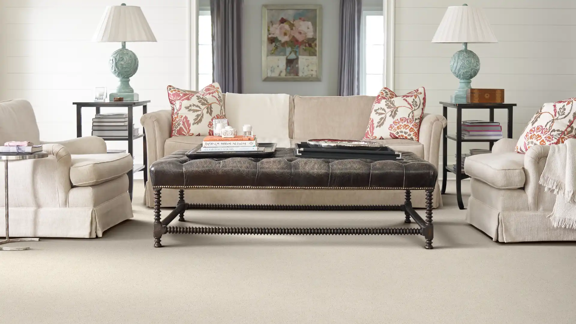 light carpet in living room with pink and teal accents